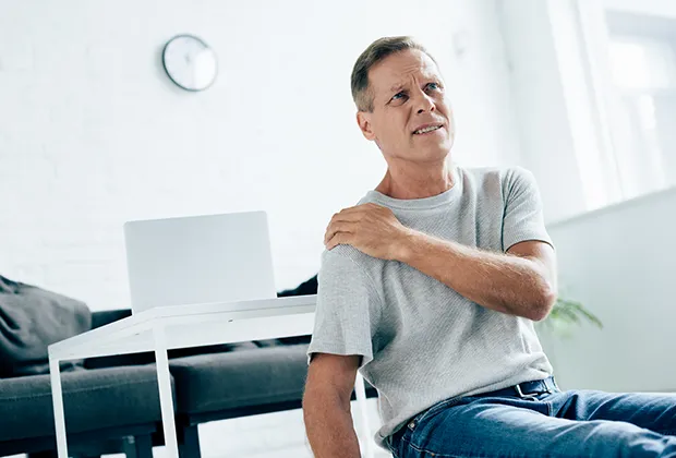 Is lung cancer causing my friend's left shoulder pain at 50?